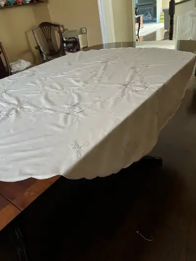 Round embroidered table cloth with cutouts, View more