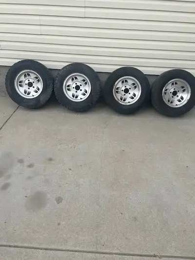 I have for sale a set of fourteen inch tires and wheels for a Ford. Two of these have General Altima...