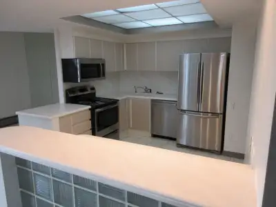 Executive living in the Huntsman! Large 1 Bedroom plus den, top floor, [penthouse} , includes washer...