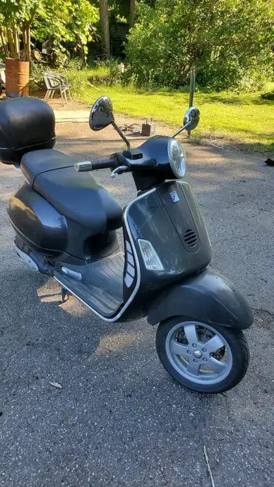 Selling my 2006 Vespa Granturismo 200 scooter! This stylish scooter is perfect for zipping around to...
