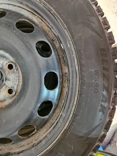 For sale are four barely used BRIDGESTONE BLIZZAK WS90 91H 1131 205/55R16 winter tires mounted on C-...