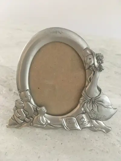 This picture frame would make a great gift for a new baby. Frame is approximately 4 inches tall and...
