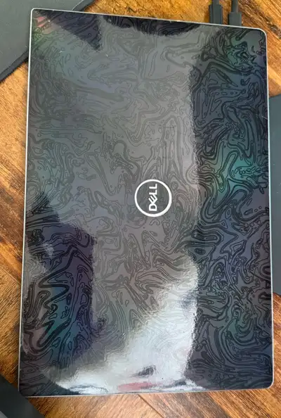 Dell XPS 13” 9305 laptop. Has an awesome dbrand skin on top (first pic). In excellent condition, bat...
