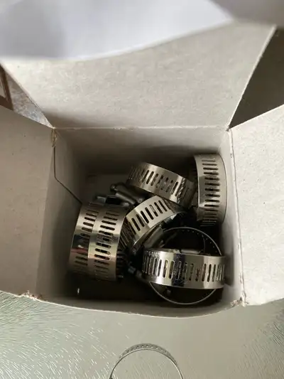 I am offering a box of new hose clamps, perfect for any DIY project or repair. These clamps are dura...