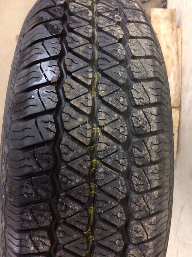 Toyota Wheel and P185/70R14 Tire. Tires & Rims Ottawa Kijiji