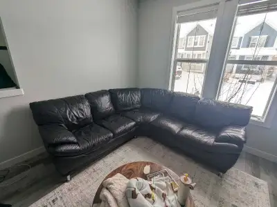 Black genuine leather sectional couch MOVING must sell!, View more