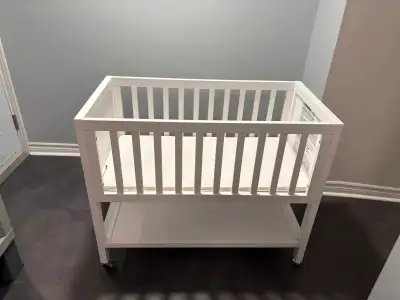 Stork bassinet / mini crib, grey color. Included photos of the white version to show what it looks l...
