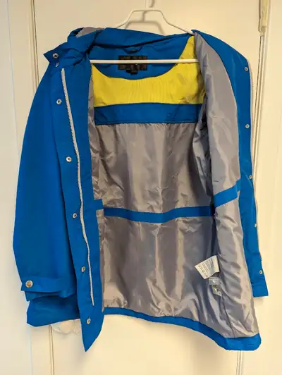 BRAND NEW. Women’s Hooded Rain coat with matching Umbrella!, View more