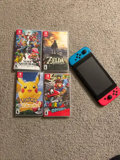 4 great games with a Nintendo Switch Console! Comes with all the cables. Docking Stations. Pokemon L...