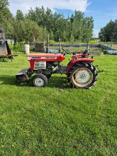 Yanmar ym1700 compact tractor,diesel,pto three point hitch. Starts excellent and very fuel efficient...