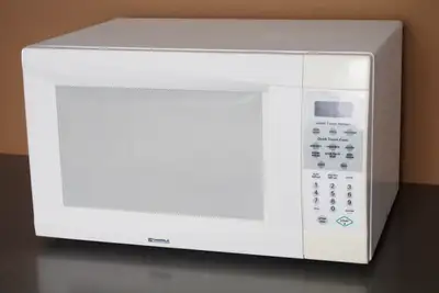 Model 88320. High power (1100W), high capacity countertop microwave. Width 22.5 in (57 cm), height 1...