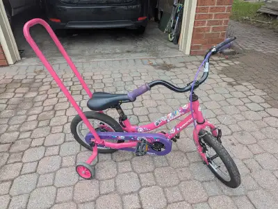 This Supercycle Kids bike is perfect for learning! Featuring a sturdy frame and a parent handle, it'...