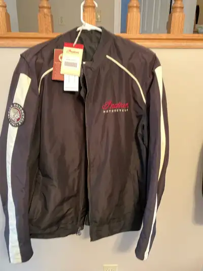 Men’s large wind jacket in good condition women’s small wind jacket and zip up sweat shirt in very g...