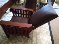 Antique reclining arm chair