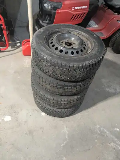 195/65R15 snow tires on steel rims, from my Ford Focus that no longer exists. They seem to have a go...