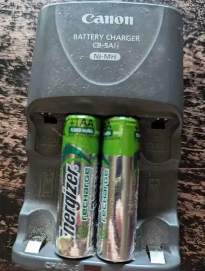 AA Battery charger with batteries , View more
