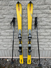 Nordica downhill skis 143 w/ Salomon bindings and GripON poles N