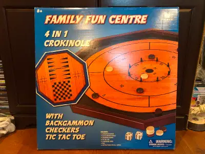 Family Fun Center, Crokinole board. New, I don’t think we ever used it! Also has backgammon and tic-...