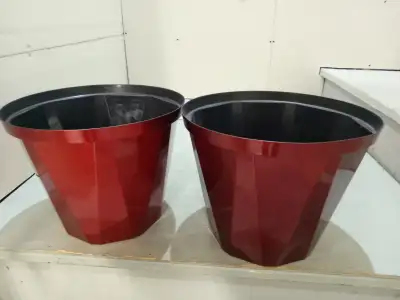 2 Red Planter $5.00 Pair Can put a planter in them PICK UP ONLY CASH ONLY Text or Call 780-695-9600...