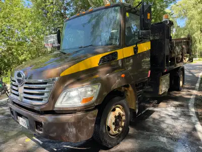 Comes with a bin and a flatbed