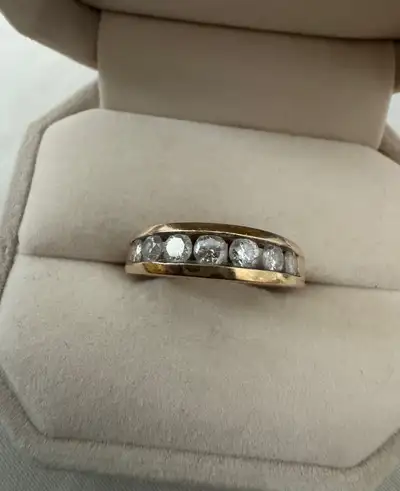 14KT Yellow Gold Diamond Ring with a channel style , View more