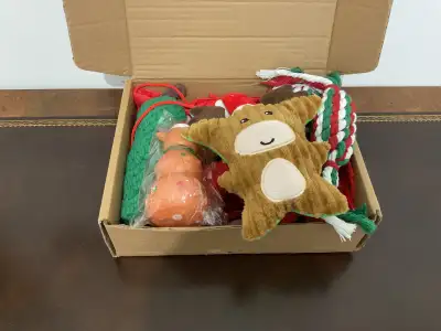 Give your four-legged loved one a bag full of Christmas toys. Gift bag is included along with seven...