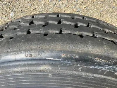 Good tire 95 percent tread Rim lugs hub is bad Bridgestone with a Michelin recap