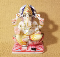 Indian Hindu elephant god Lord Ganesha painted white marble