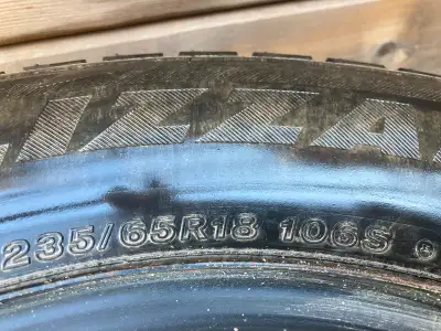 Set of 4 Bridgestone Blizzak snow tires + steel rims + nuts . Only used for 4 months (can show recei...
