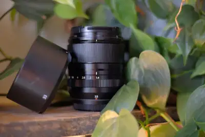Fuji 33mm 1.4 Lens One of Fuji's greatest hits. Includes Box, manual, caps, lens hood, and will incl...