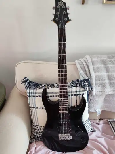 Strat with HSS pickups ("Fat Strat") Good shape. Plays and holds tune well