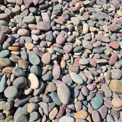 Upgrade your outdoor space with 40mm Montana Rainbow Rock. This decorative landscaping rock is perfe...