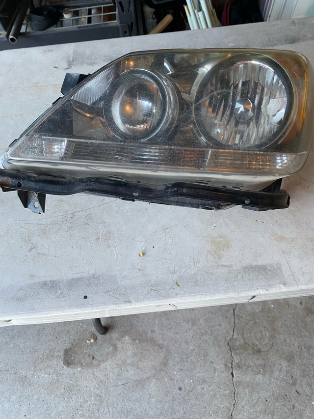 drivers side headlight assembly for 2005-2010 Honda Odyssey in Auto Body Parts in Lethbridge