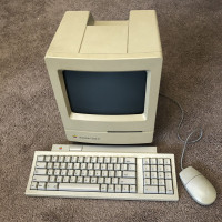 Vintage Macintosh Classic II with its original carrying case