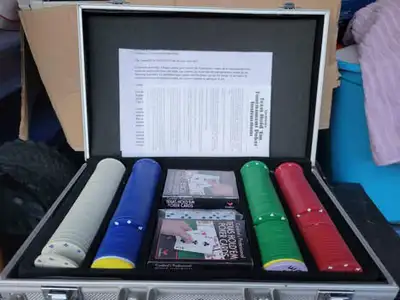 Poker Set in Metal Case With Playing Cards. Is in good condition