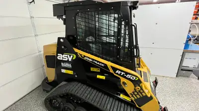 ASV RT50, yanmar turbo diesel, skidsteer is fully loaded, with heat/ac, rear view camarea, electroni...