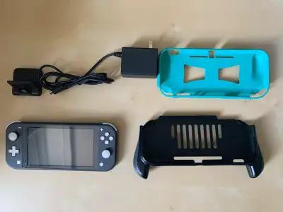 Nintendo Switch Lite (Grey) w/accessories, View more