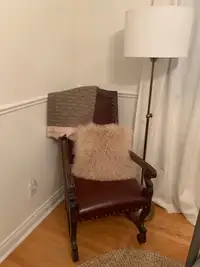Two Burgundy Leather Throne Chairs