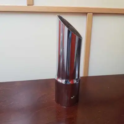 Enhance your car style with this chrome exhaust tip, measuring approximately 8 inches in length. Ple...