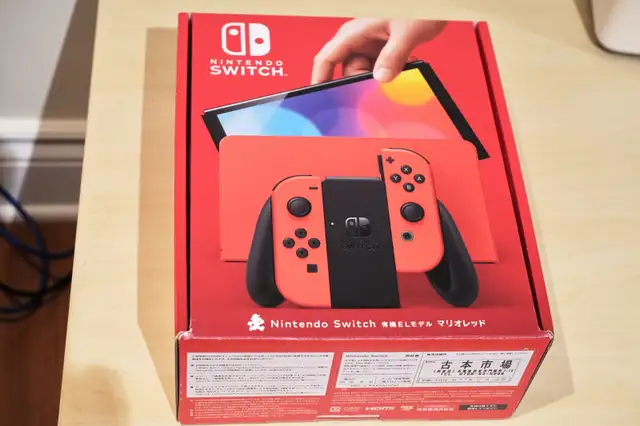 Nintendo Switch Oled (extra controller, 512gb sd card) in Nintendo Switch in Longueuil / South Shore - Image 3