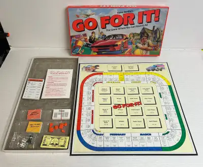 Basically new, open box. Old vintage Go For It! board game by Parker 1986. Complete and never played...