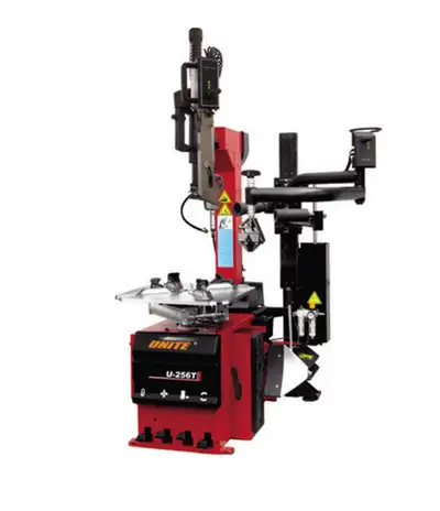 Automatic tilt back tire changer with dual assist arm for tires with a rim from 14" to 26" (max. whe...