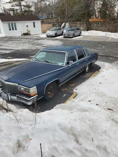 Rare 1988 Cadillac Brougham lots of new parts on and off the car still NEEDS work never seen winter...