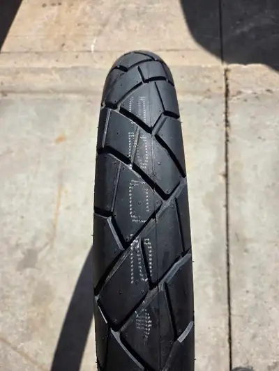 NEW Dunlop Trailmax Mixtour motorcycle tire 90/90-21 was installed on a new Honda Transalp 750. No m...