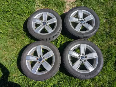Upgrade your vehicle with this set of four original Volkswagen 17-inch alloy rims mounted with Conti...