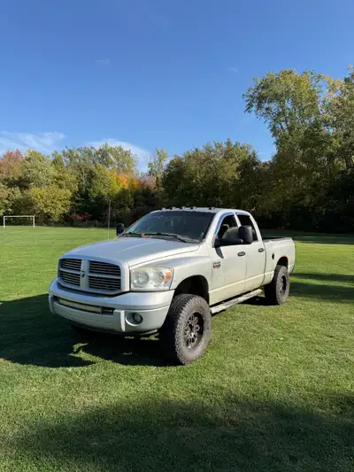 3rd gen Dodge cummins 6.7L fully deleted and tuned 5 inch straight pipe Rust free other than rear wh...