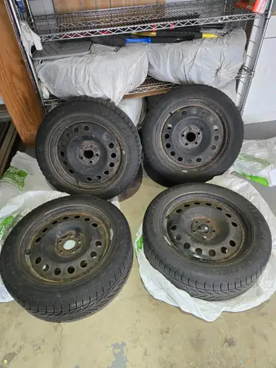 Set of four used, winter tires in great condition. Only two seasons old. 215/55/R17. Includes the wh...