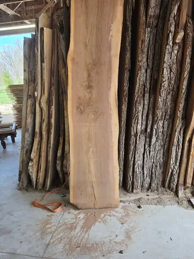 I have a huge selection of Live Edge Walnut $10 a board foot, as well as eight more species includin...