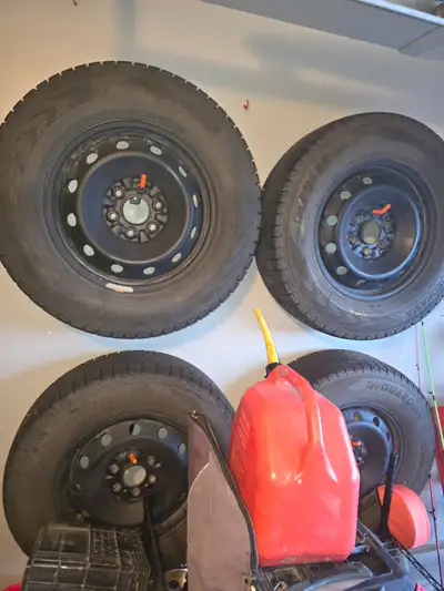 4 Yokohama iceGUARD studless winter tires mounted on 17” steel rims. Size: 245/70R17 Used for one wi...