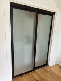 Sliding closet doors, frosted glass with dark brown trim 60"x80"